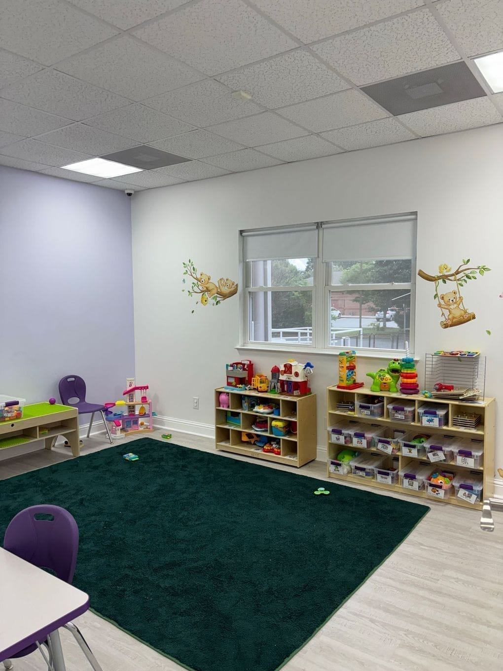 Quiet room with low lighting and a beanbag for sensory breaks